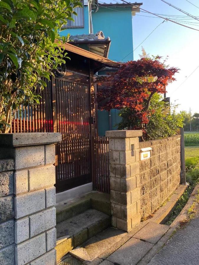 泉佐野市幽舍の庭アパートメント エクステリア 写真